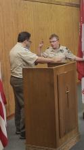 Scoutmaster Wilson swearing in Will Maifeld